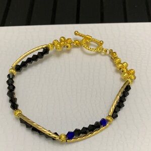 Elegant Gold tone  and Black crystal Bracelet NWOT